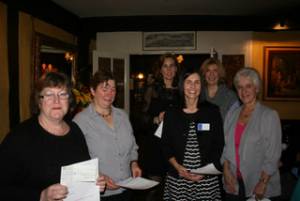 The 6 Charity Representatives with their cheques